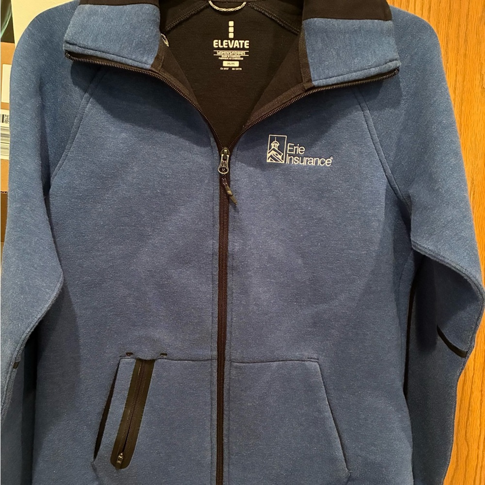 Blue Performance Jacket; Erie insurance company but can be altered